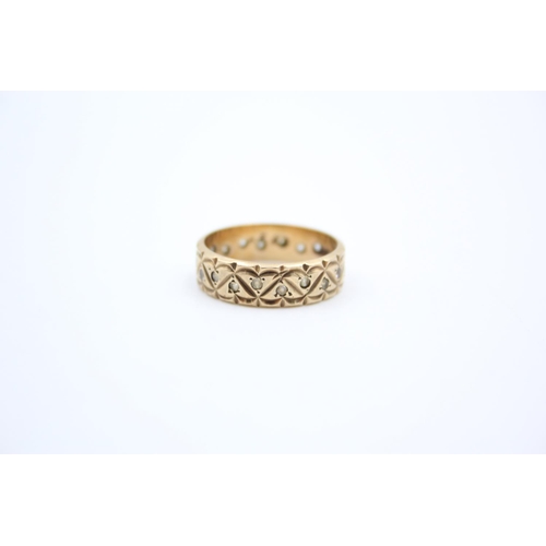 186 - A 9ct gold gemstone full eternity band ring - approx. gross weight 3.3 grams