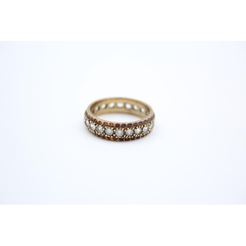 187 - A 9ct gold gemstone full eternity ring - approx. gross weight 3.9 grams