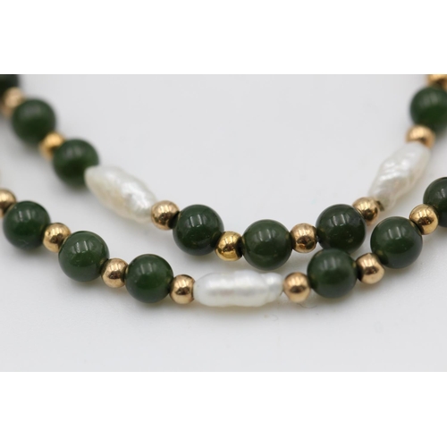 202 - A 9ct gold jade and pearl bead necklace - approx. gross weight 8.4 grams