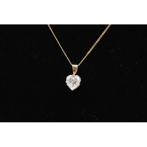 212 - A 9ct gold gemstone heart pendant necklace - approx. gross weight 2.2 grams