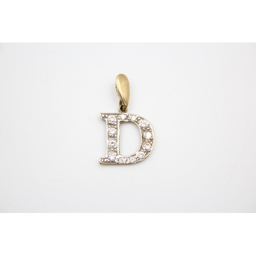 213 - A 9ct gold letter 'D' gemstone pendant - approx. gross weight 2.2 grams