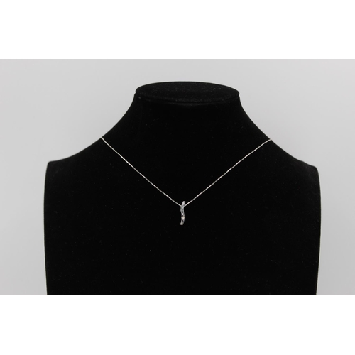 215 - A 9ct white gold diamond pendant necklace - approx. gross weight 1.6 grams