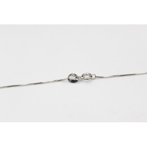 215 - A 9ct white gold diamond pendant necklace - approx. gross weight 1.6 grams