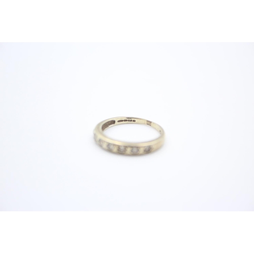 217 - A 9ct gold gemstone half eternity ring - approx. gross weight 1.6 grams