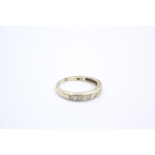 217 - A 9ct gold gemstone half eternity ring - approx. gross weight 1.6 grams