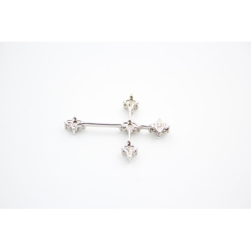 229 - A 9ct white gold gemstone cross pendant - approx. gross weight 1.3 grams