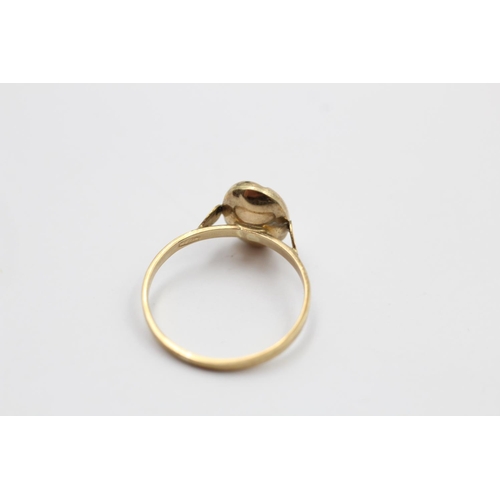 231 - A 9ct gold lucky coffee bean ring - approx. gross weight 0.9 grams