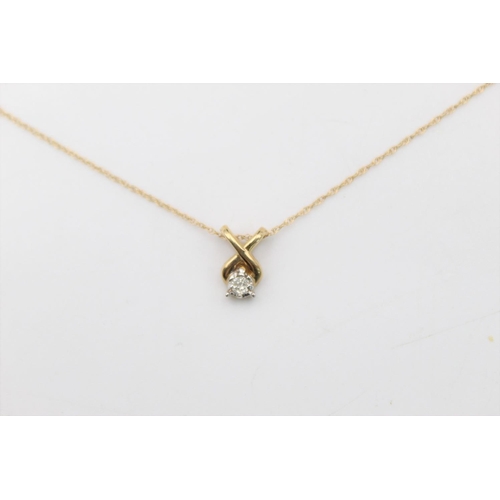 234 - A 9ct gold diamond pendant necklace - approx. gross weight 1 gram