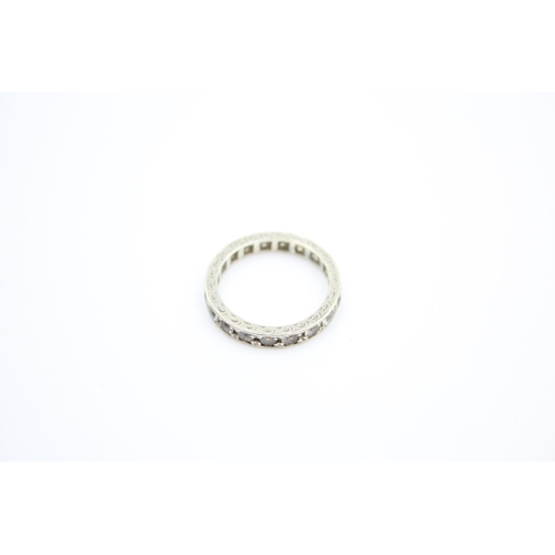 241 - A 9ct white gold gemstone full eternity ring - approx. gross weight 2 grams