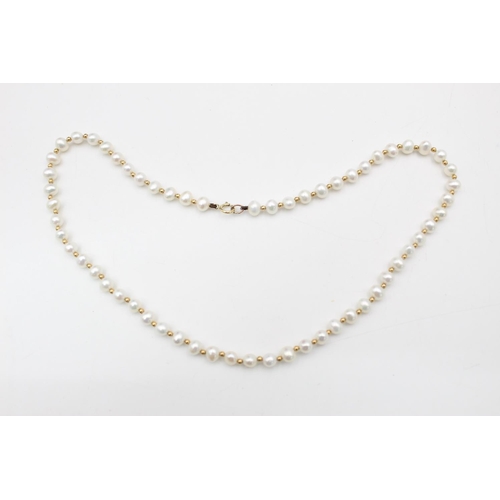 249 - A 9ct gold bead and pearl necklace - approx. gross weight 11.4 grams