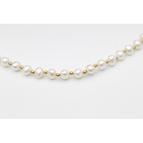 249 - A 9ct gold bead and pearl necklace - approx. gross weight 11.4 grams