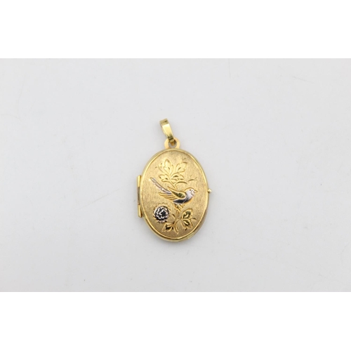 48 - A 9ct gold bird design oval locket pendant - approx. gross weight 2.2 grams