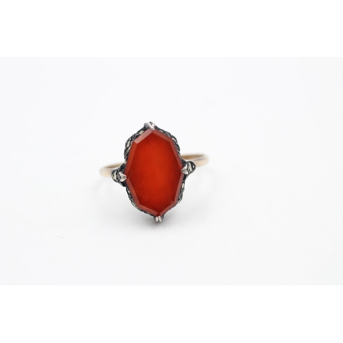 65 - A 9ct gold carnelian and marcasite ring - approx. gross weight 2.8 grams