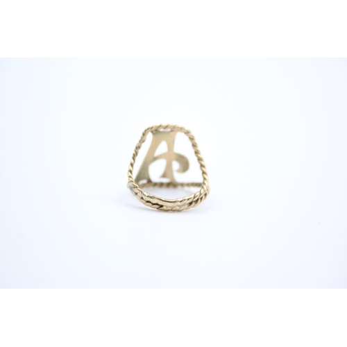 69 - A 9ct gold letter 'A' ring - approx. gross weight 2 grams