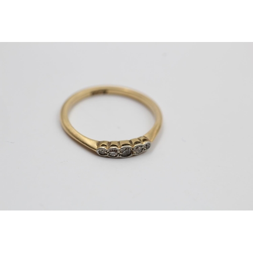 73 - An Art Deco 18ct gold mine cut diamond ring - approx. gross weight 2.3 grams