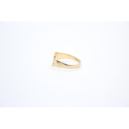 75 - A 9ct gold signet ring - approx. gross weight 1.9 grams