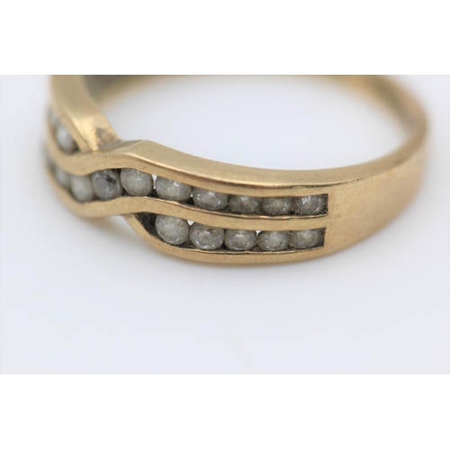 79 - A 9ct gold two row gemstone half eternity ring - approx. gross weight 2.2 grams