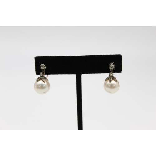 88 - A pair of 9ct gold silver set pearl and gemstone drop screw back earrings - approx. gross weight 8.7... 