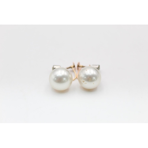 88 - A pair of 9ct gold silver set pearl and gemstone drop screw back earrings - approx. gross weight 8.7... 