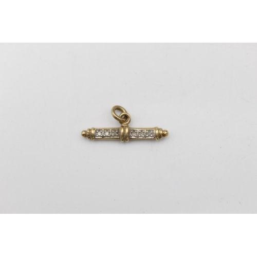 89 - A 9ct gold fancy diamond T-bar charm holder/pendant - approx. gross weight 1.9 grams