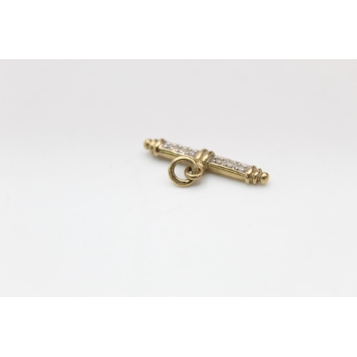 89 - A 9ct gold fancy diamond T-bar charm holder/pendant - approx. gross weight 1.9 grams