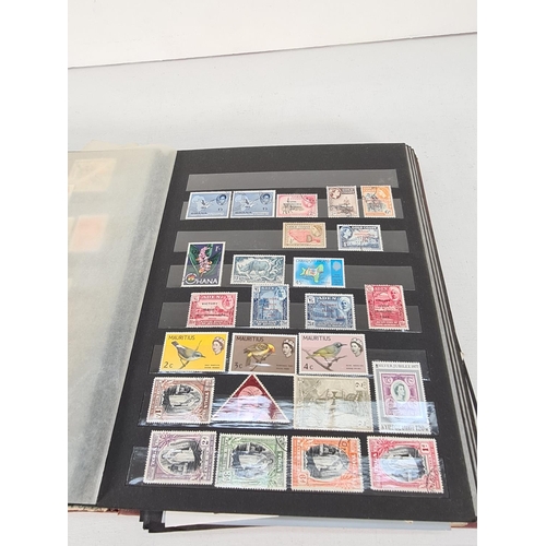 608 - A stamp album containing a collection of various stamps