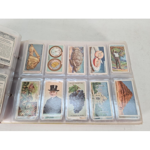 614 - A large collection of vintage Wills's cigarette cards to include Household Hints, Lucky Charms, Rail... 