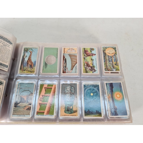 614 - A large collection of vintage Wills's cigarette cards to include Household Hints, Lucky Charms, Rail... 