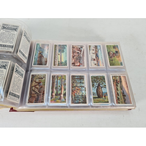 614 - A large collection of vintage Wills's cigarette cards to include Household Hints, Lucky Charms, Rail... 