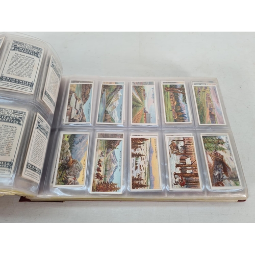 614 - A large collection of vintage Wills's cigarette cards to include Household Hints, Lucky Charms, Rail... 