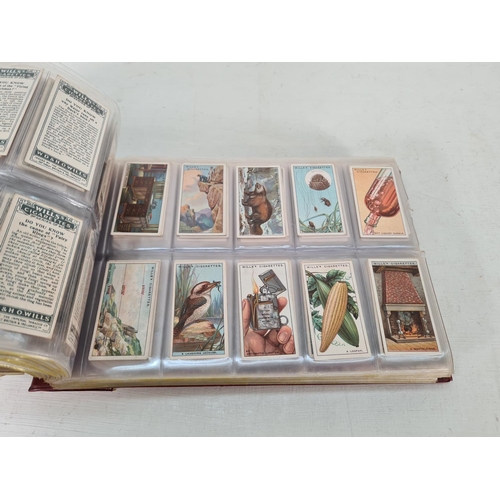 614 - A large collection of vintage Wills's cigarette cards to include Household Hints, Lucky Charms, Rail... 