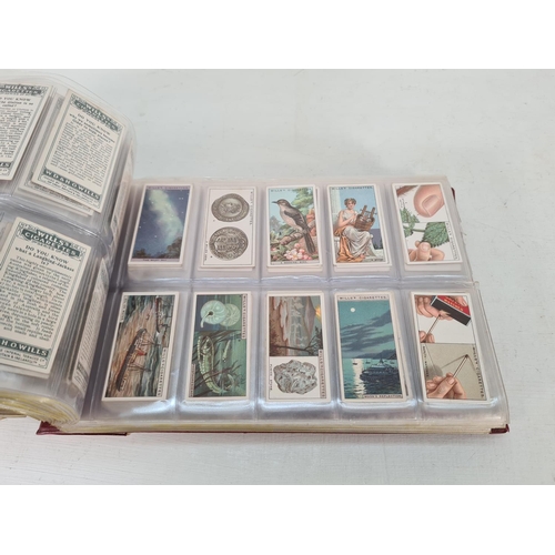 614 - A large collection of vintage Wills's cigarette cards to include Household Hints, Lucky Charms, Rail... 