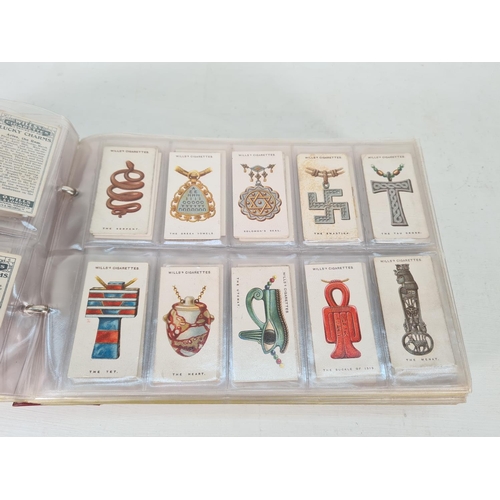 614 - A large collection of vintage Wills's cigarette cards to include Household Hints, Lucky Charms, Rail... 