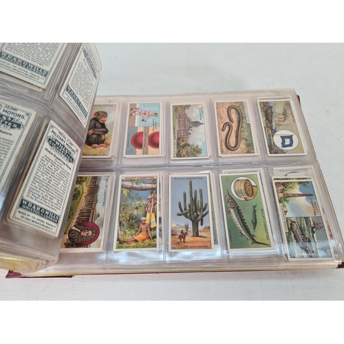 614 - A large collection of vintage Wills's cigarette cards to include Household Hints, Lucky Charms, Rail... 