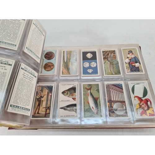 614 - A large collection of vintage Wills's cigarette cards to include Household Hints, Lucky Charms, Rail... 