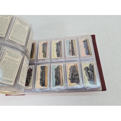 614 - A large collection of vintage Wills's cigarette cards to include Household Hints, Lucky Charms, Rail... 