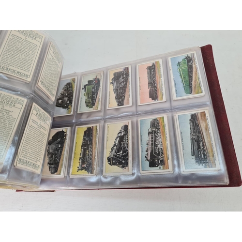 614 - A large collection of vintage Wills's cigarette cards to include Household Hints, Lucky Charms, Rail... 