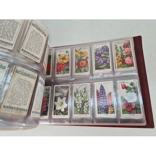 614 - A large collection of vintage Wills's cigarette cards to include Household Hints, Lucky Charms, Rail... 