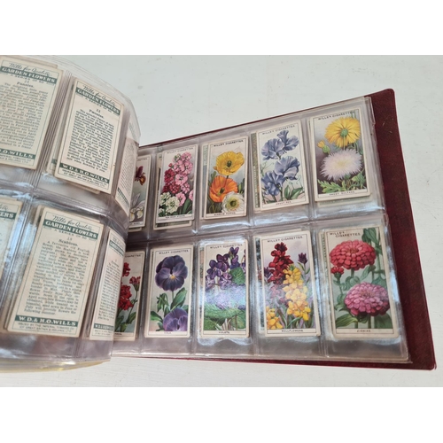 614 - A large collection of vintage Wills's cigarette cards to include Household Hints, Lucky Charms, Rail... 