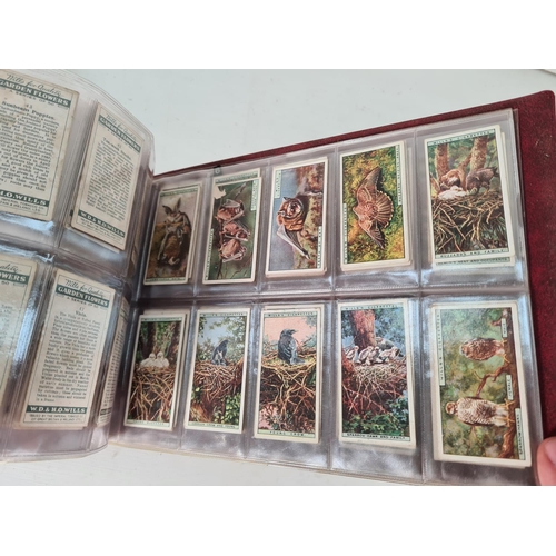 614 - A large collection of vintage Wills's cigarette cards to include Household Hints, Lucky Charms, Rail... 