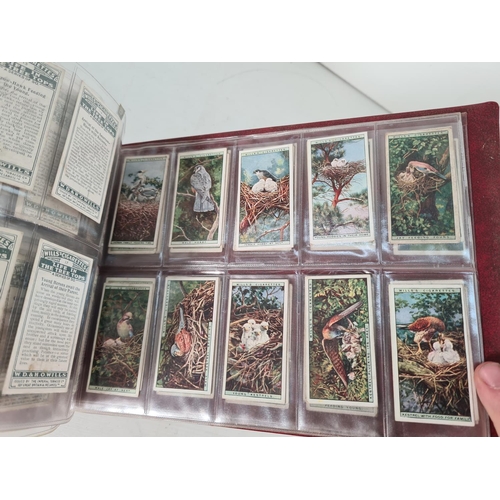 614 - A large collection of vintage Wills's cigarette cards to include Household Hints, Lucky Charms, Rail... 