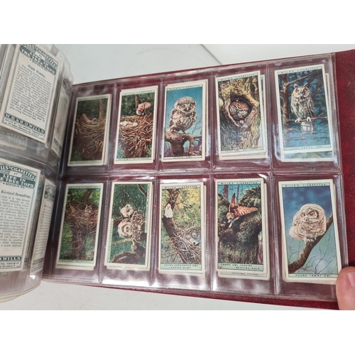 614 - A large collection of vintage Wills's cigarette cards to include Household Hints, Lucky Charms, Rail... 