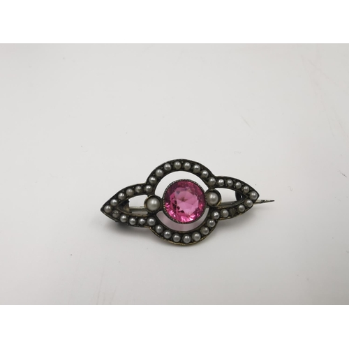 255 - Six various antique pin brooches to include sterling silver with seed pearls and ruby paste gemstone... 