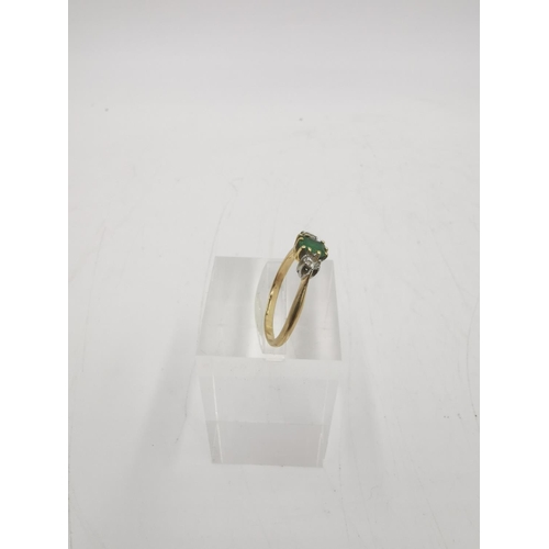 256 - An 18ct yellow gold emerald and diamond ring, size N - approx. gross weight 2.1 grams