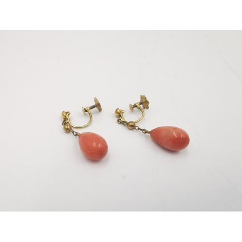 260 - Three pairs of yellow metal drop earrings, one pair of 9ct gold coral - approx. gross weight 2 grams... 