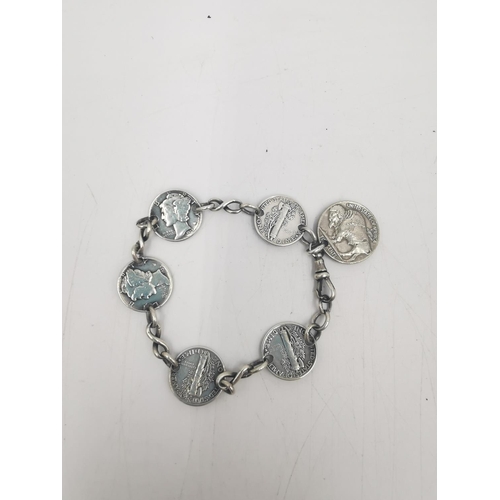 268 - Two bracelets, one white metal charm bracelet with various charms - approx. gross weight 95 grams an... 