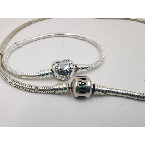 275 - Two pieces of Pandora .925 silver jewellery, one bracelet and one 42cm chain necklace - approx. gros... 