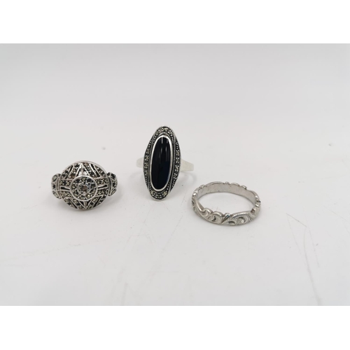 276 - Ten assorted silver rings to include .925 onyx and marcasite - size S, sterling opal - size R, Siam ... 