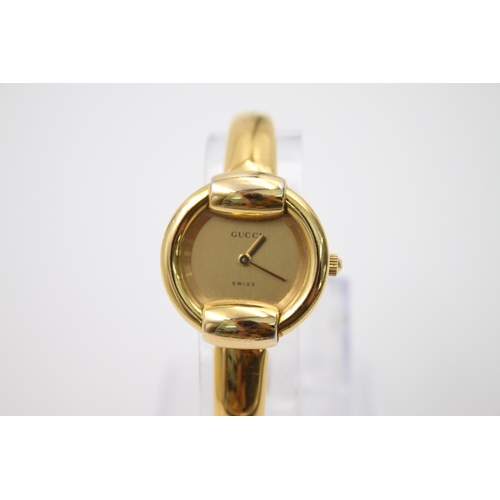 286 - A boxed Gucci 1400L gold tone ladies quartz wristwatch