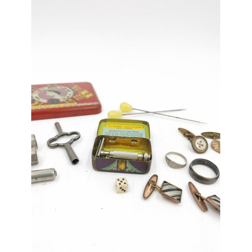 326 - A collection of assorted curios to include The Laurel Ladies Boudoir Safety Razor, A.J.G sterling si... 